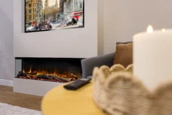 Charlton & Jenrick Go Eco Media Wall 150 Electric Fire angled view with orange flame effect